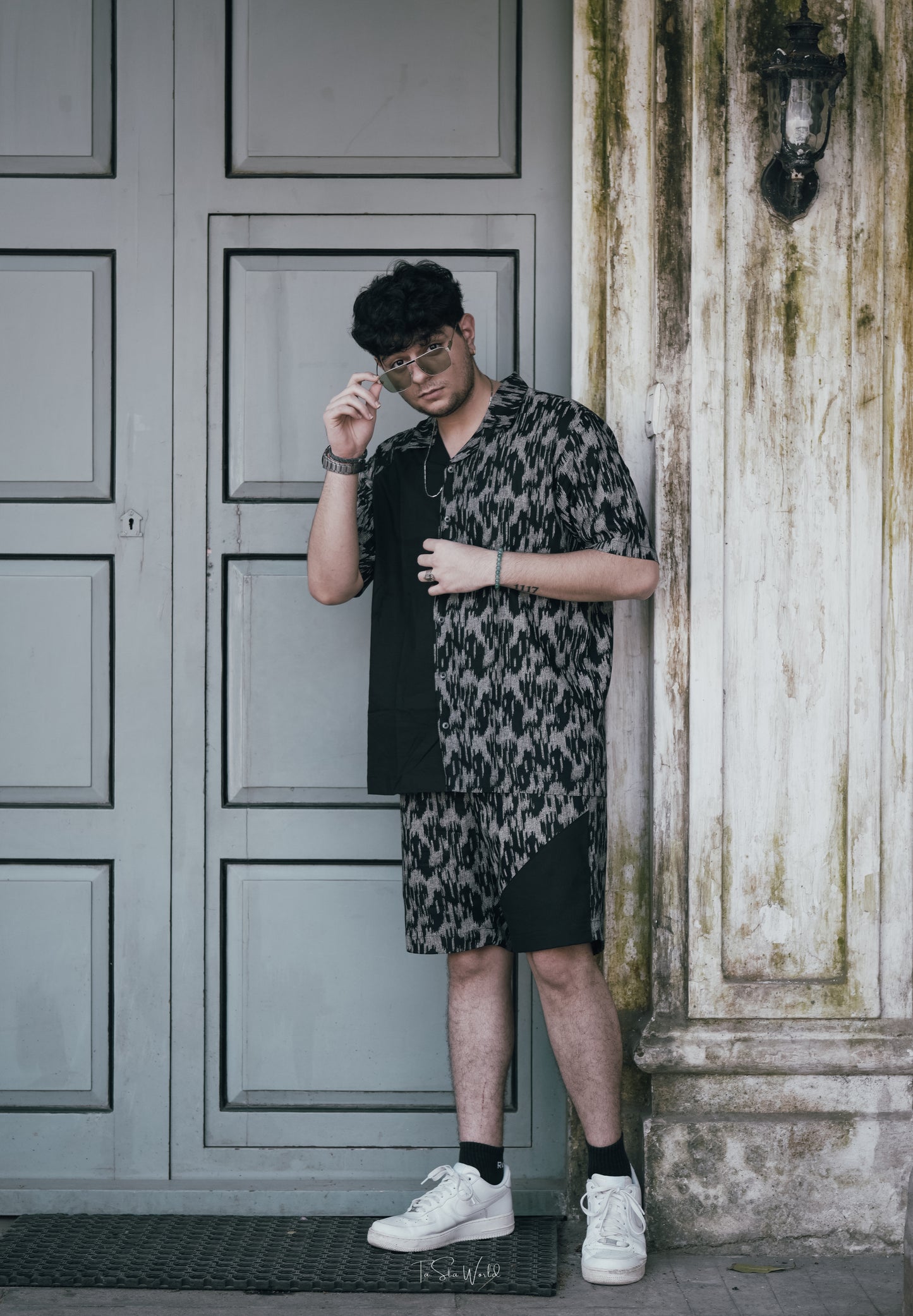 Black and grey abstract printed men’s co-ord set with short-sleeve shirt and matching shorts, designer summer outfit for men in India.